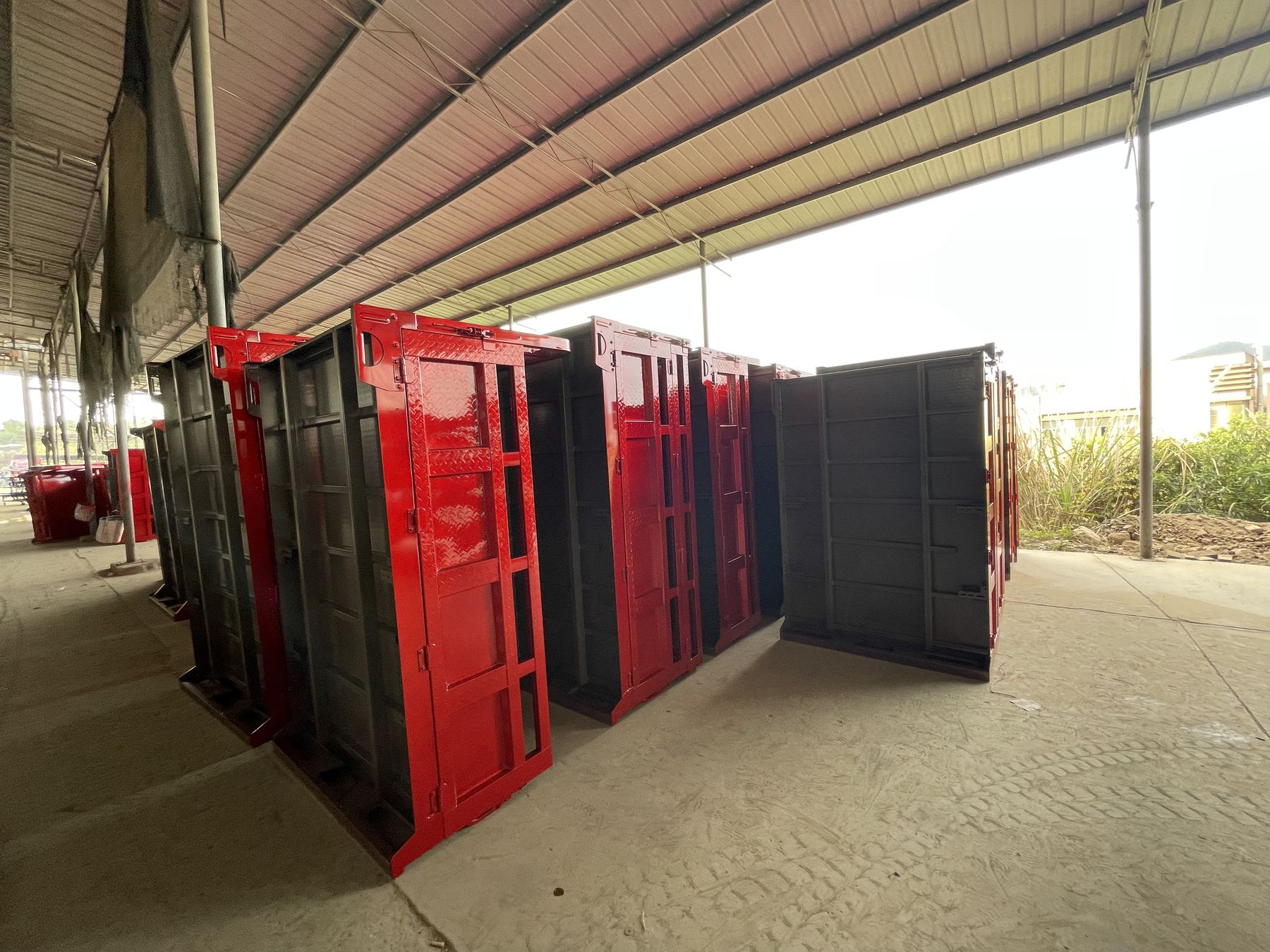 Red and black cargo boxes prepared for tricycle orders