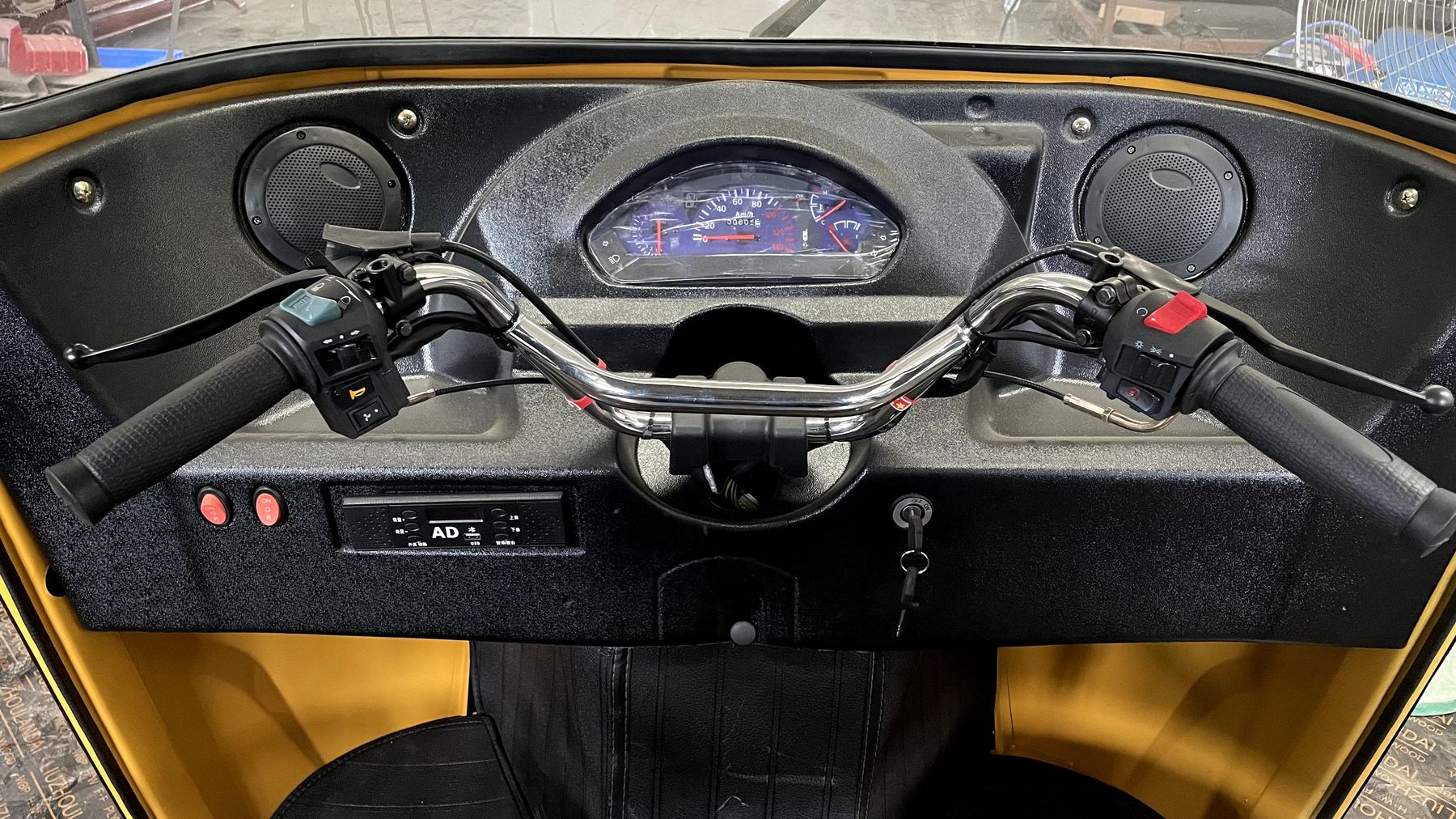 Dashboard and handlebar detail of passenger model